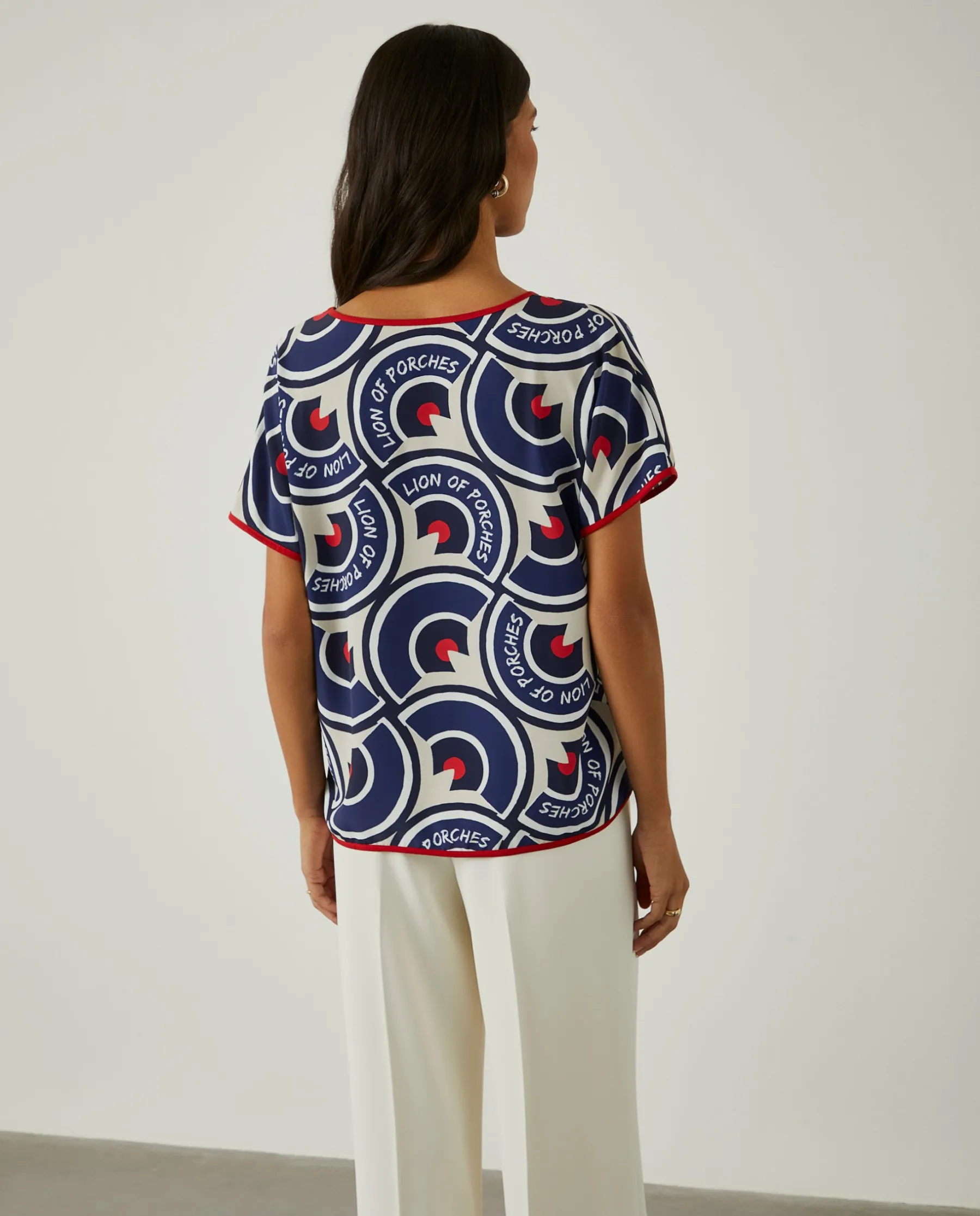MULHER LION OF PORCHES Blusas^Blusa decote em V com padrão geométrico