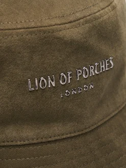 LION OF PORCHES Bonés / Gorros|Bonés / Gorros^Panamá de algodão com logotipo