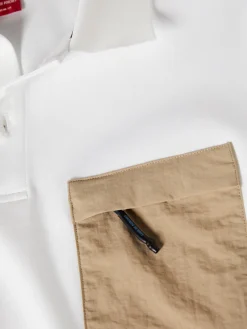 LION OF PORCHES Polos^Polo slim fit com bolso em contraste
